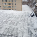 Работа по  очистке кровли.
